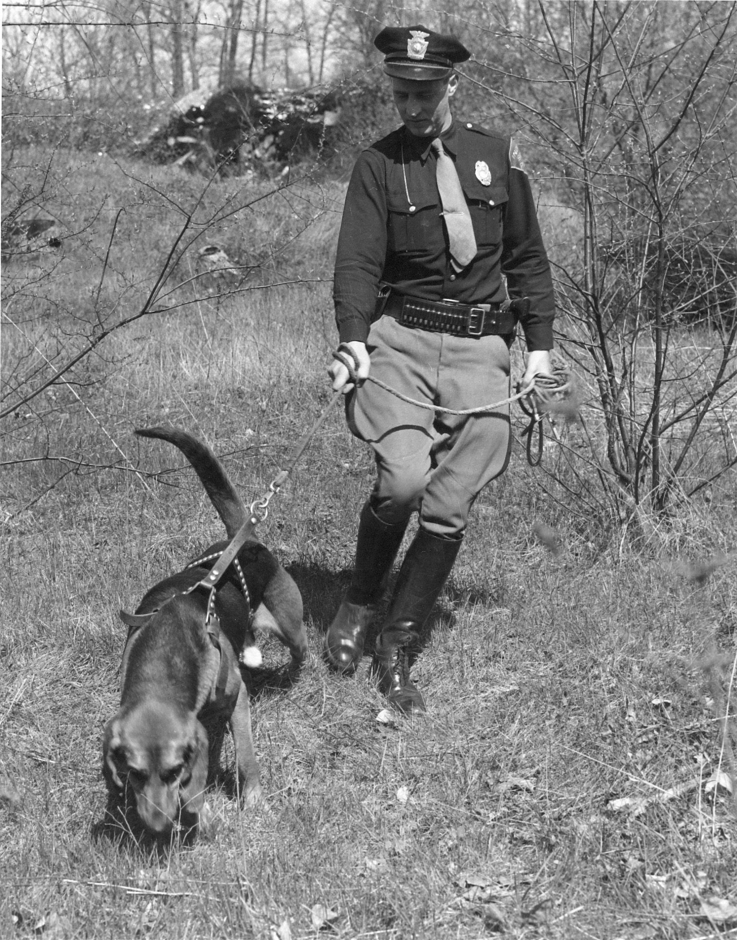 Trooper Sam Patton with his bloodhound Brutus, 1936